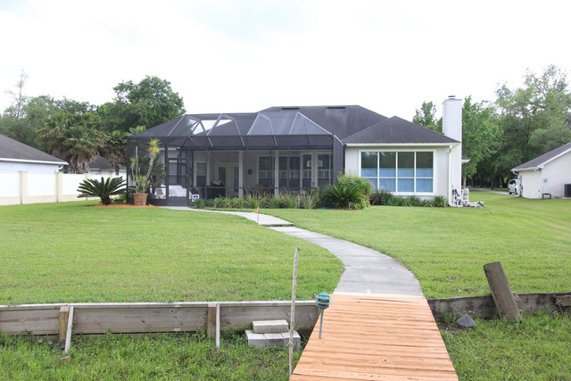 Gated Waterfront Home on 1.5 Acres