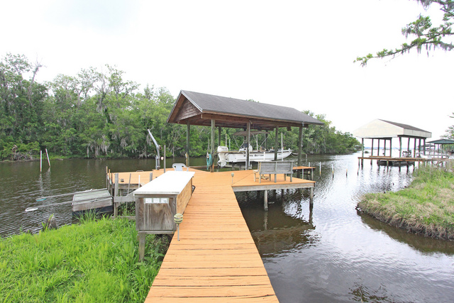 Gated Waterfront Home on 1.5 Acres